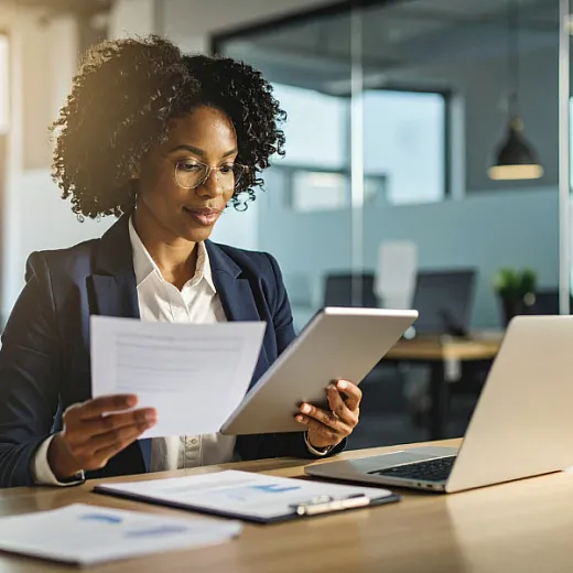professional women on computer viewing files